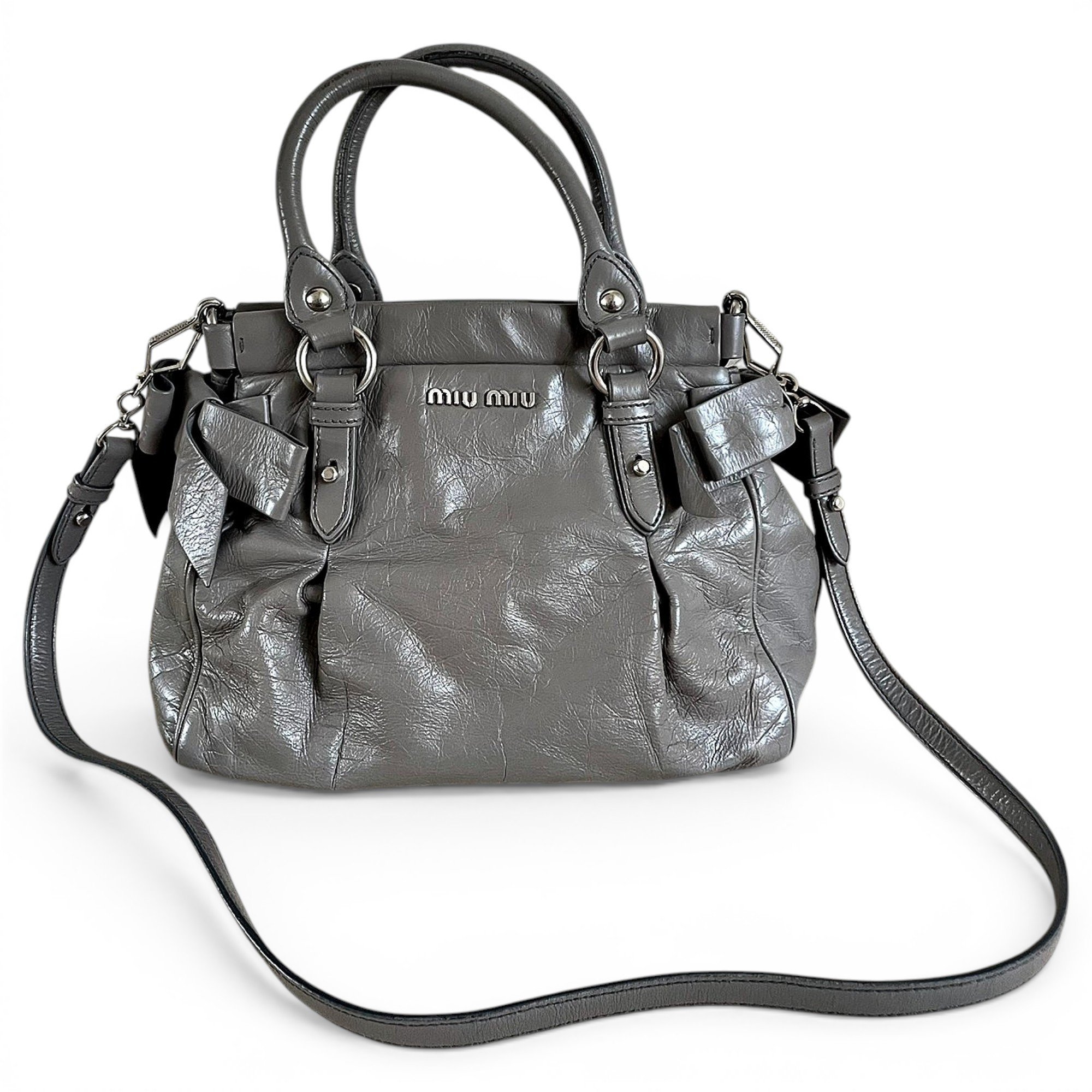 Bow bag leather handbag