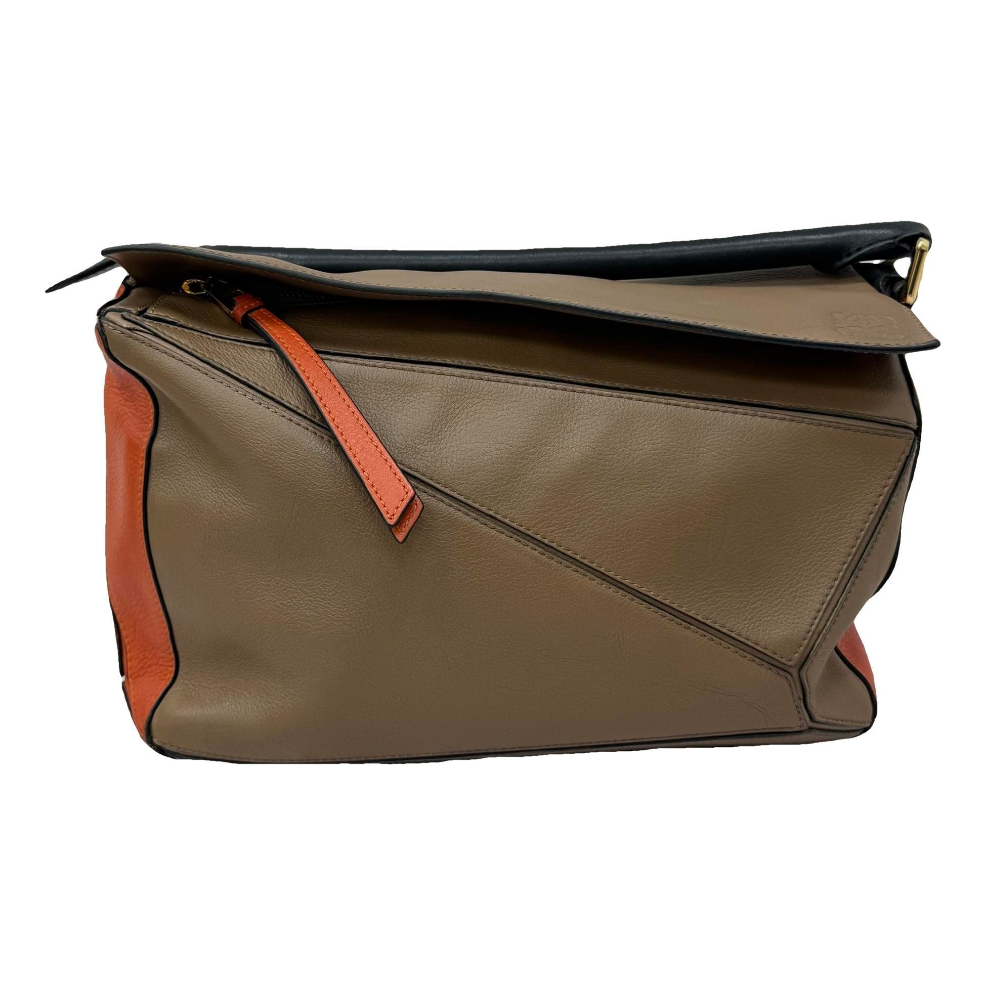 Puzzle leather handbag