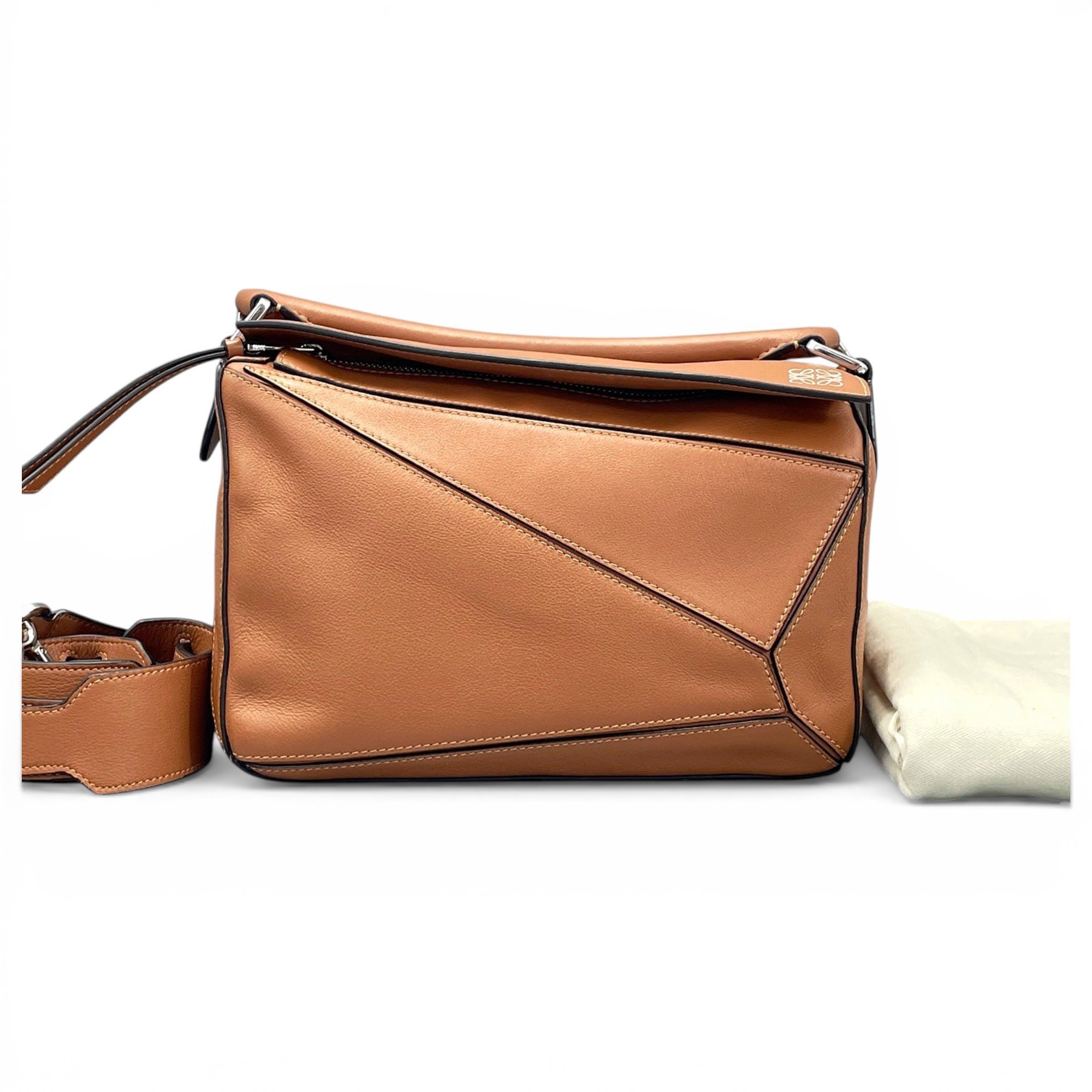 Puzzle leather handbag