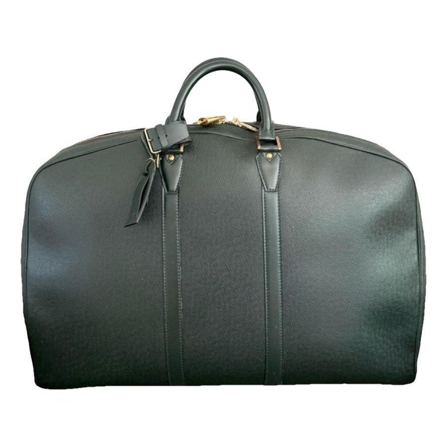 Helanga patent leather travel bag