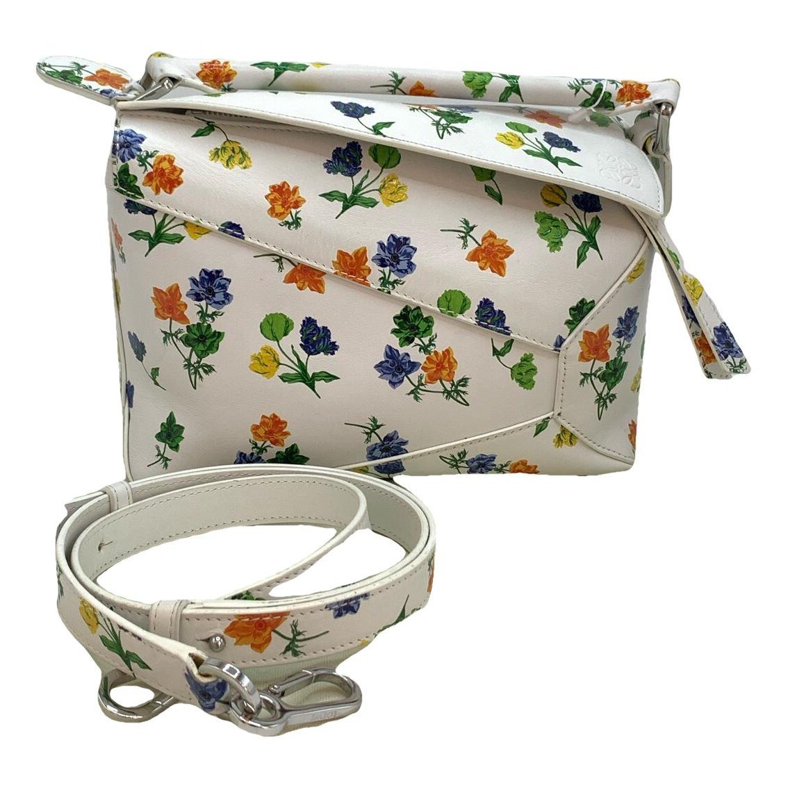 Puzzle leather handbag