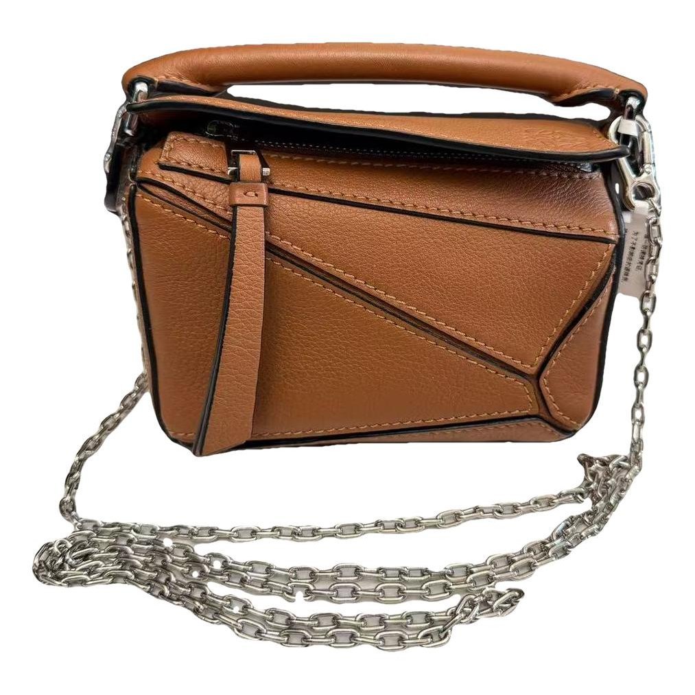 Puzzle leather handbag