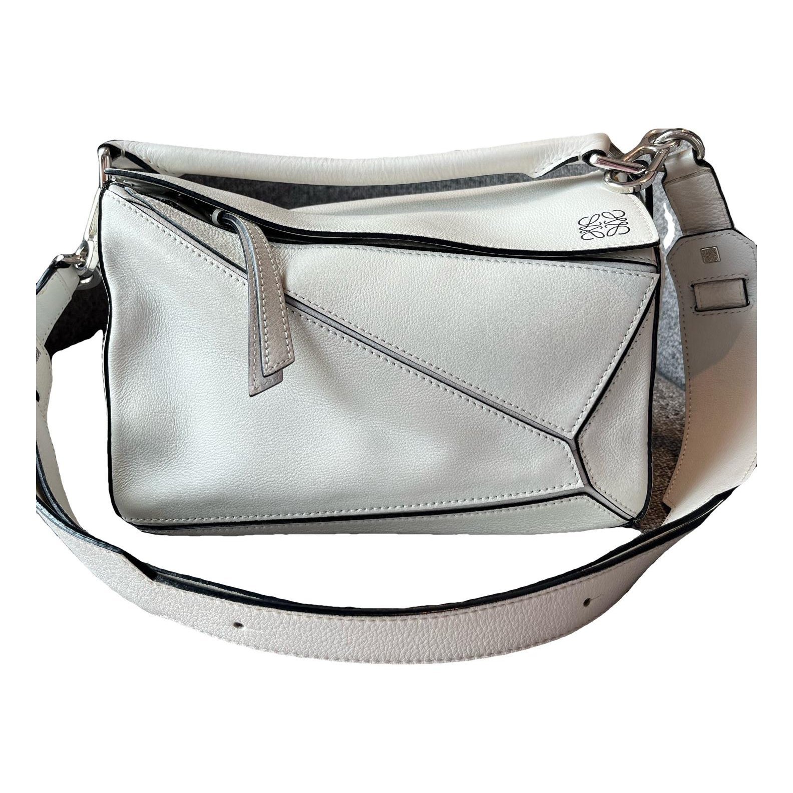 Puzzle leather handbag