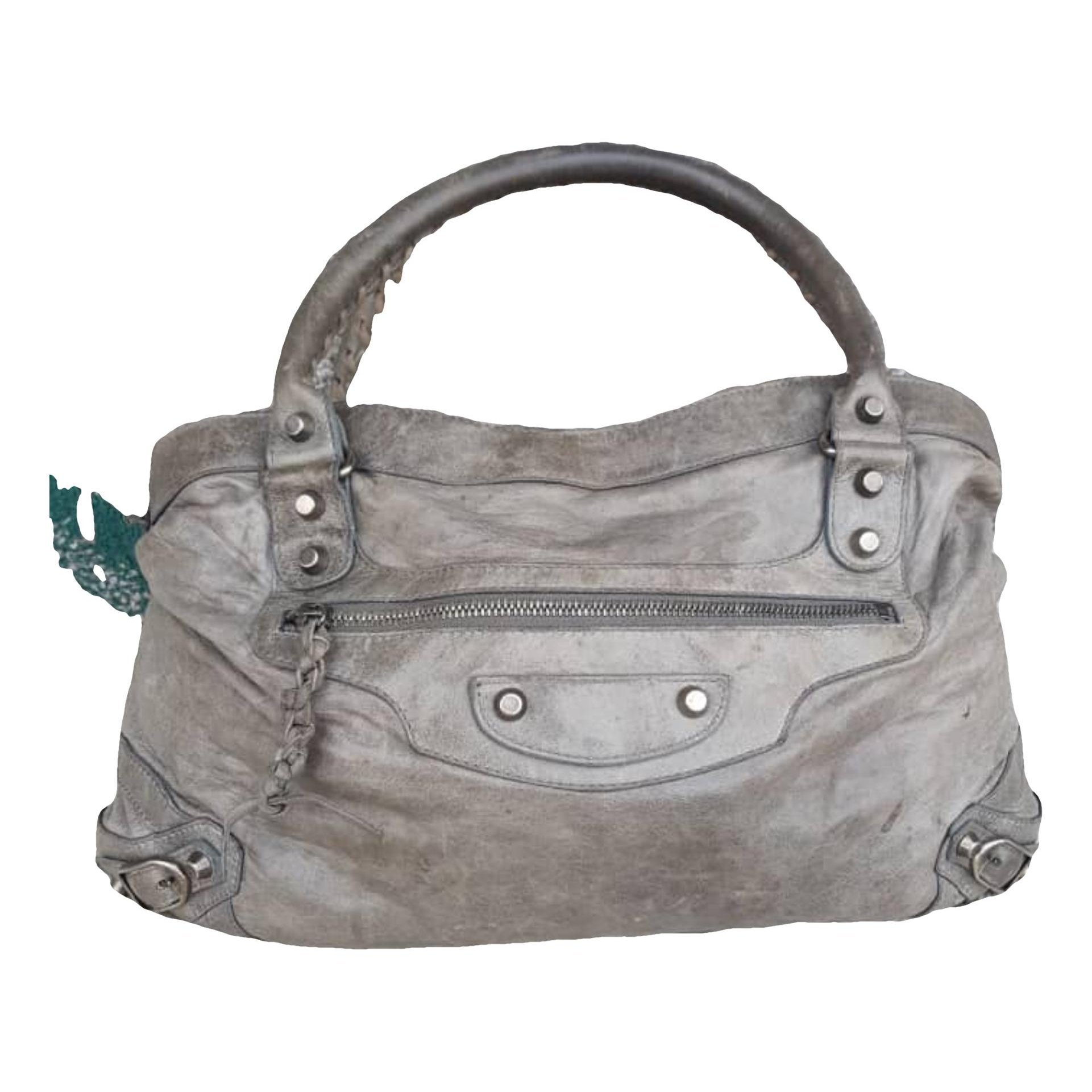 First leather handbag