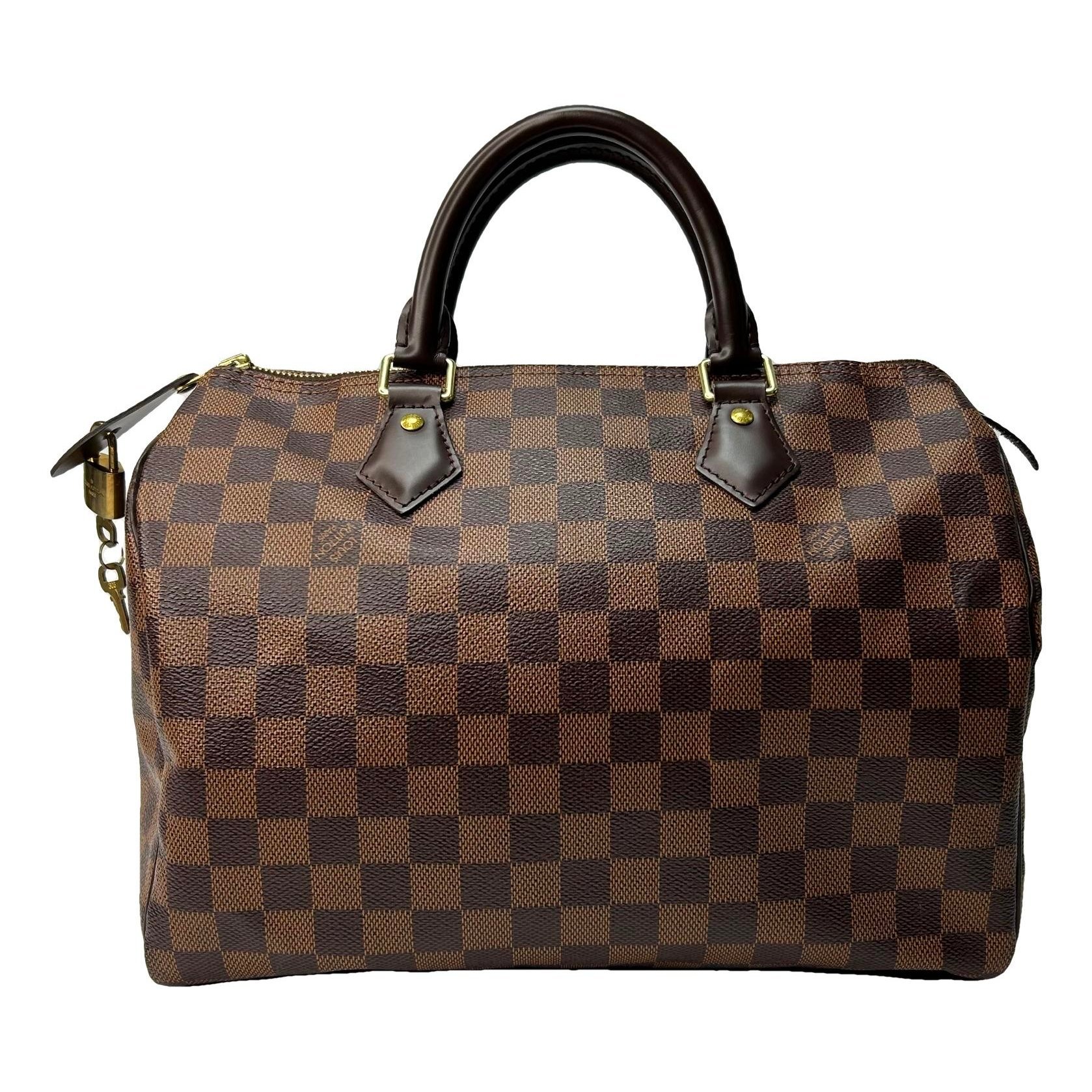 Speedy leather handbag
