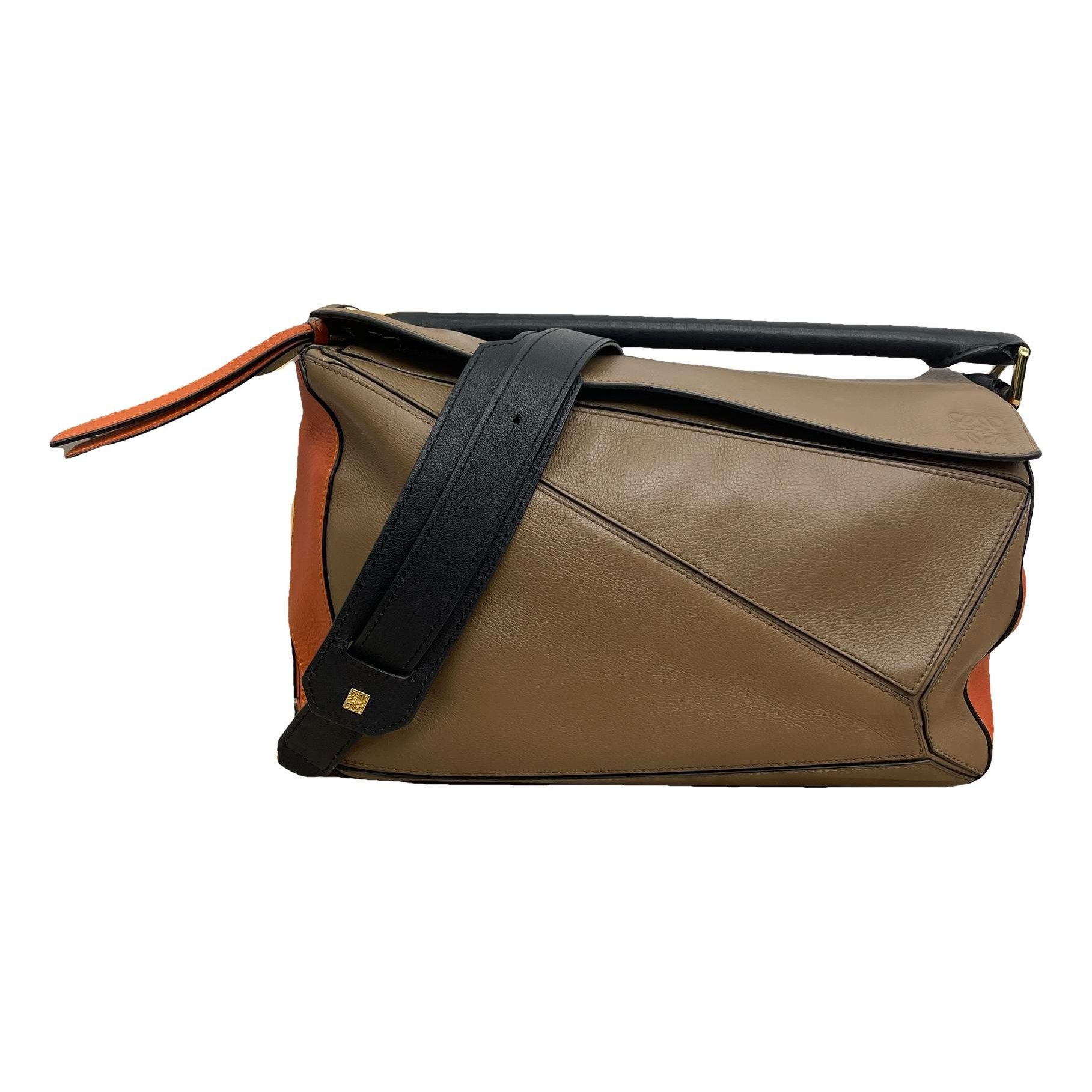 Puzzle leather handbag