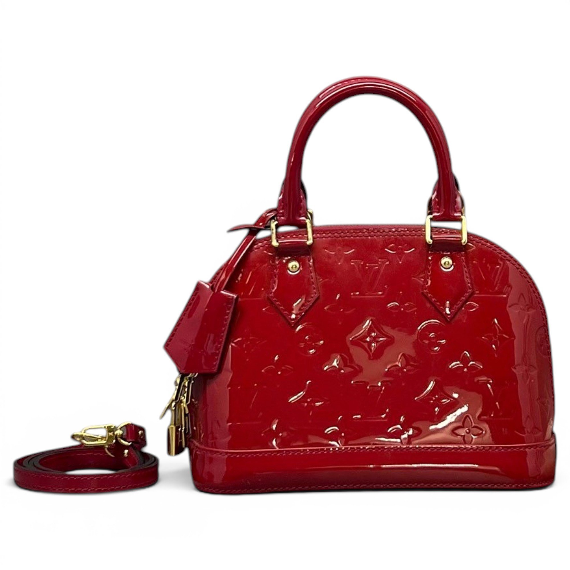 Louis Vuitton Alma patent leather handbag
