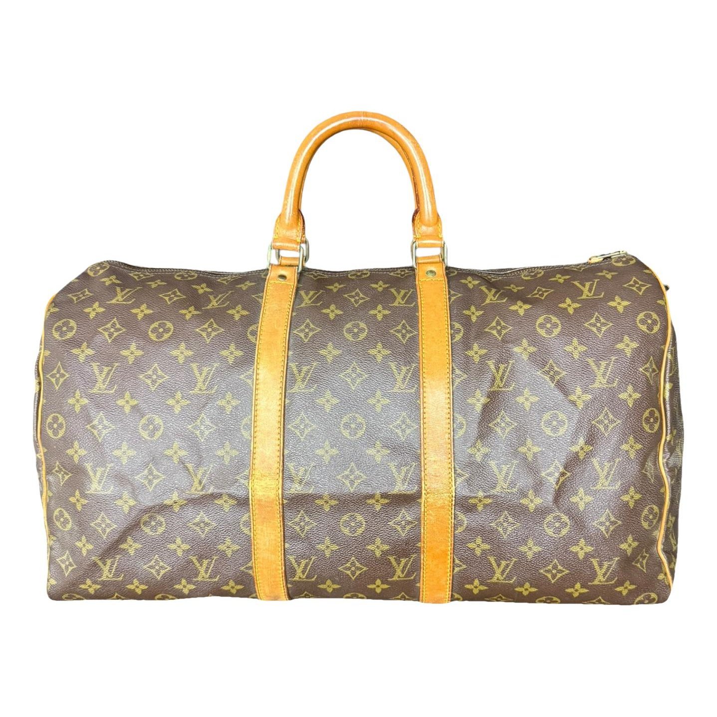 Louis Vuitton Keepall leather travel bag