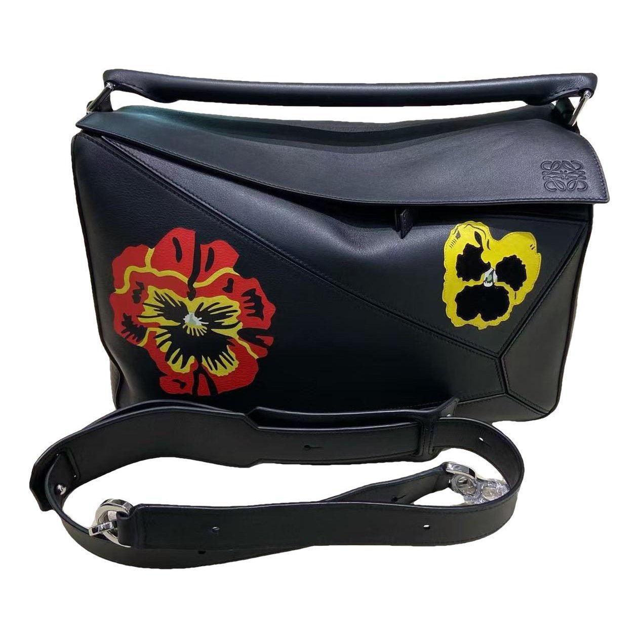 Puzzle leather handbag