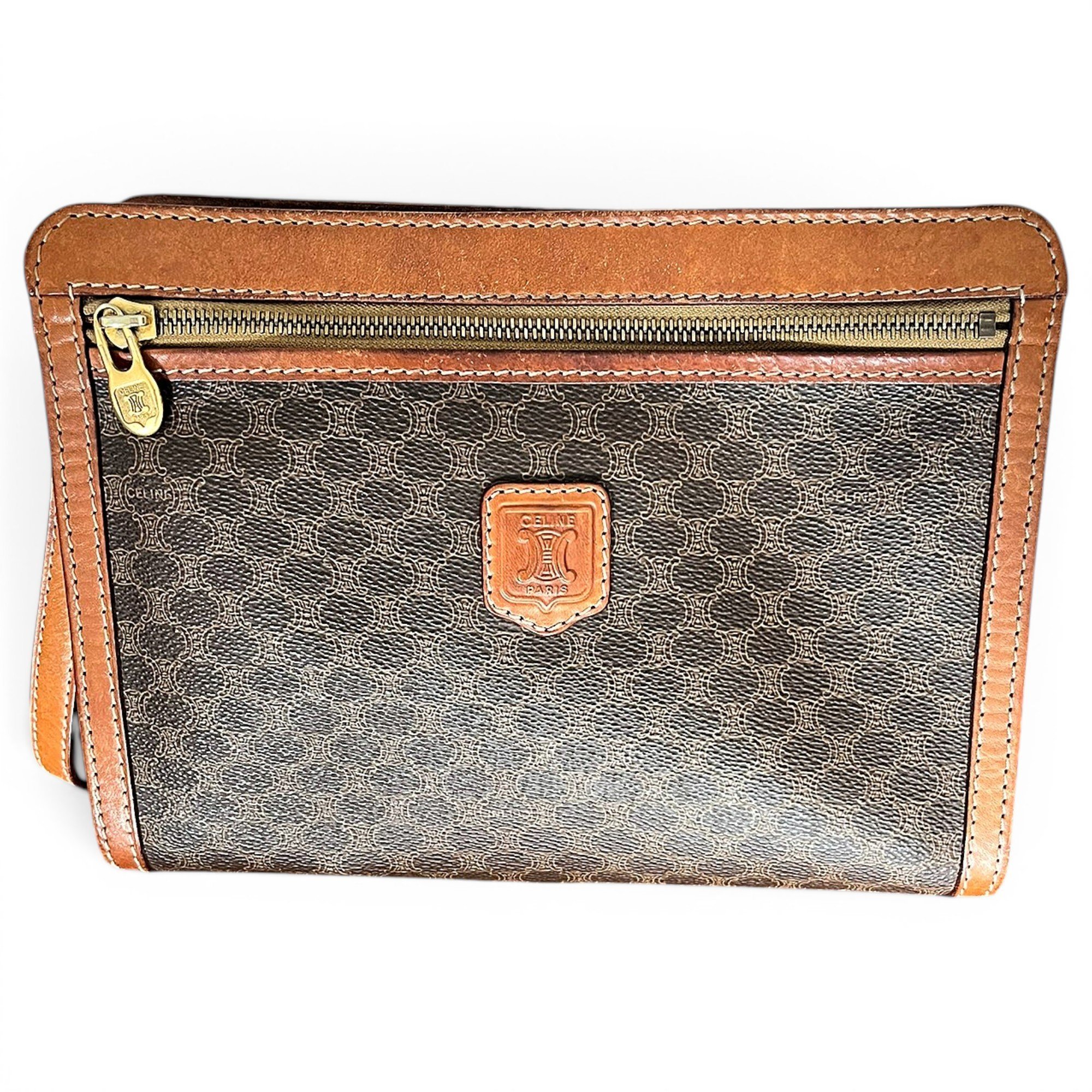 Triomphe Vintage leather clutch bag