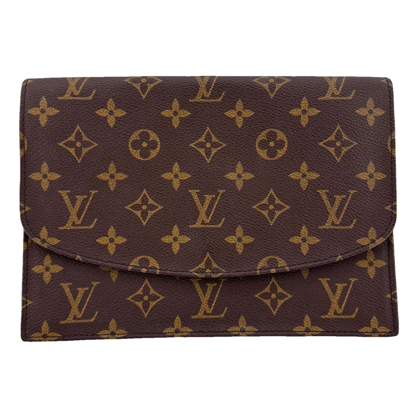 Sellier cloth clutch bag