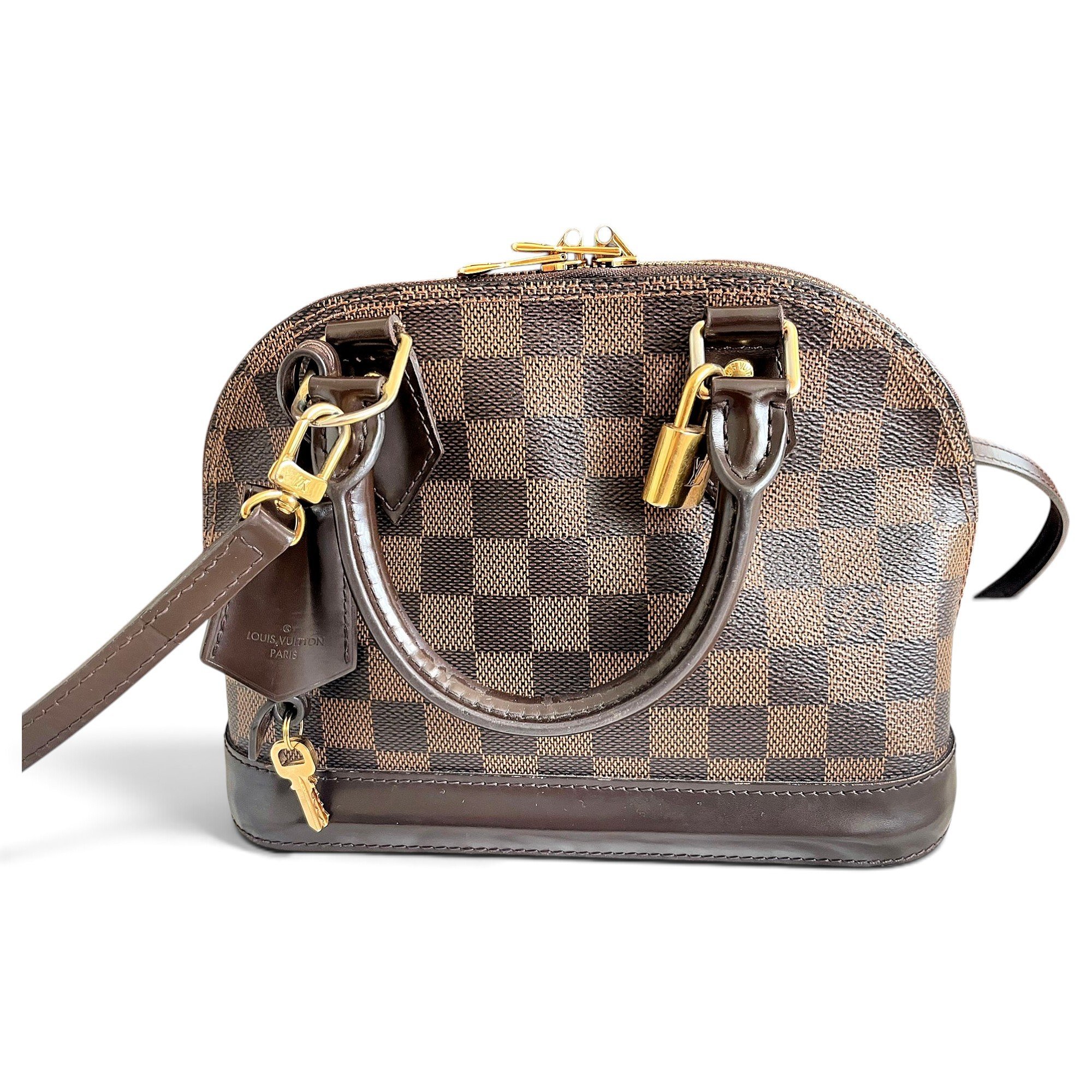 Louis Vuitton Alma BB cloth handbag
