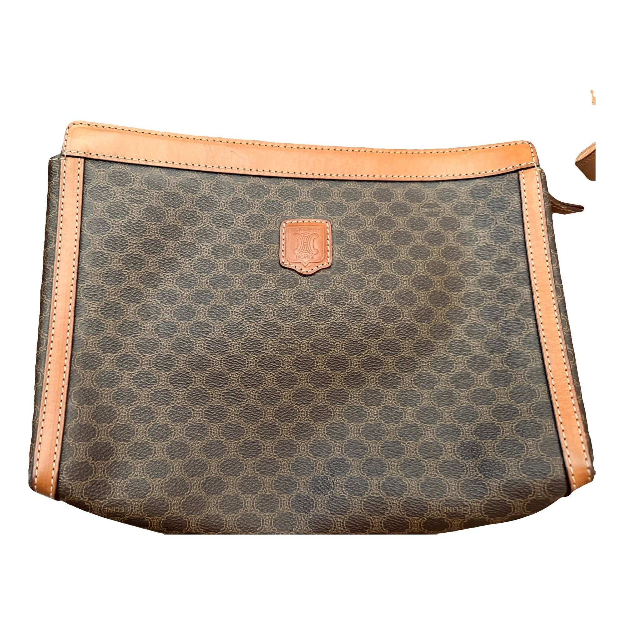 Triomphe Vintage leather clutch bag