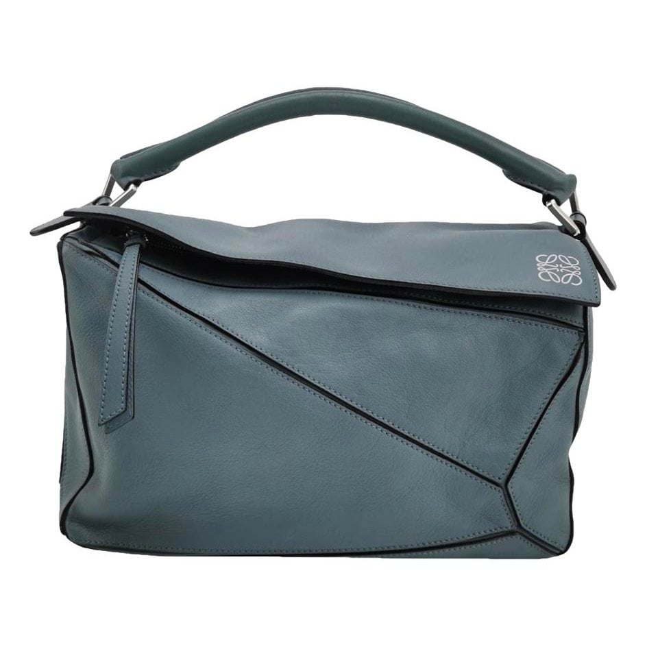 Puzzle leather handbag