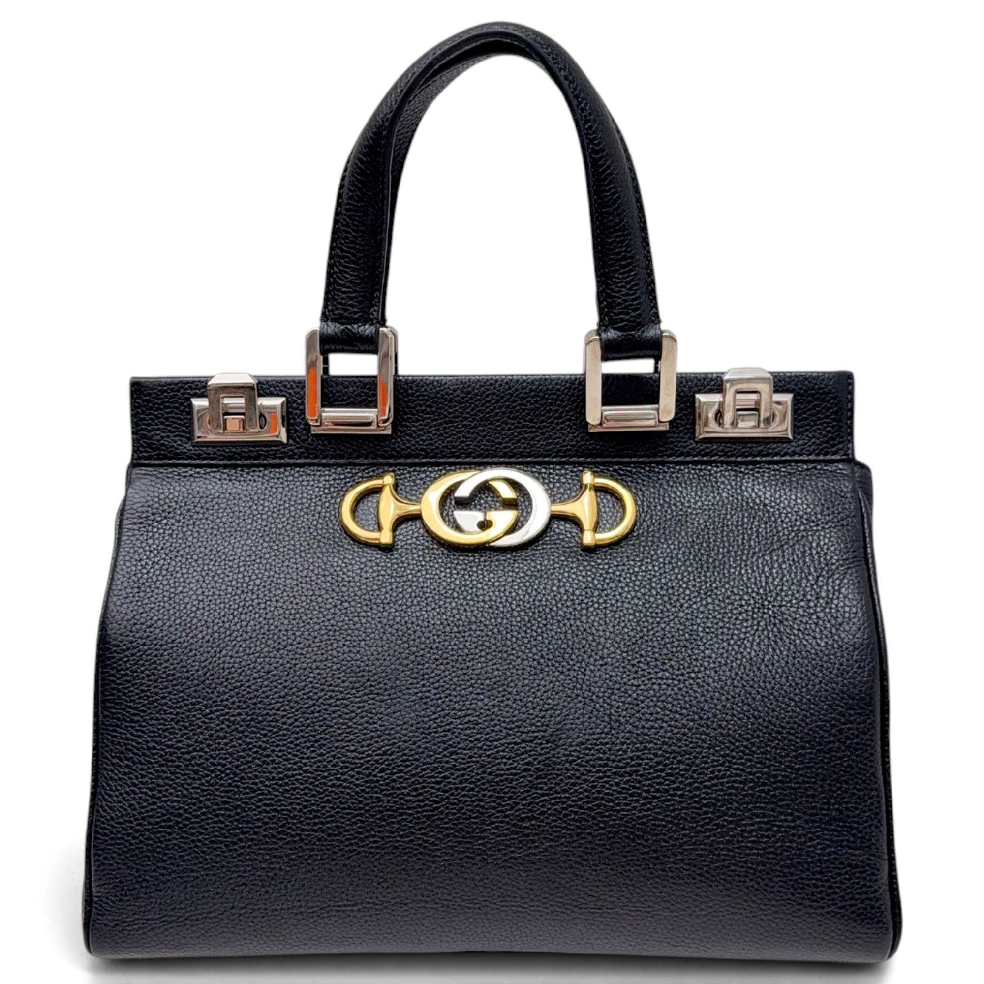Zumi leather handbag