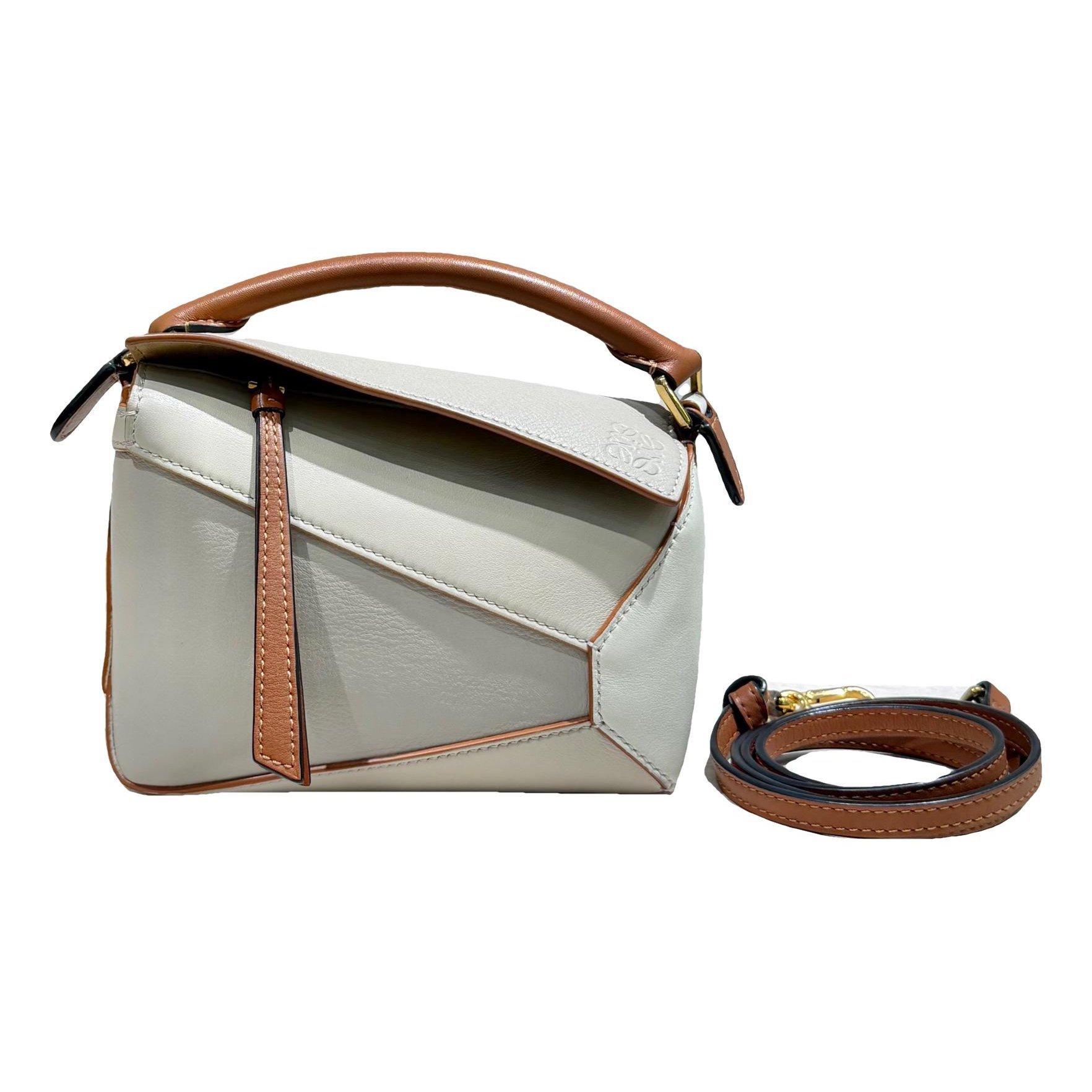 Puzzle leather handbag