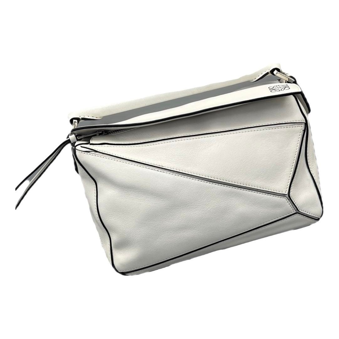 Puzzle leather handbag
