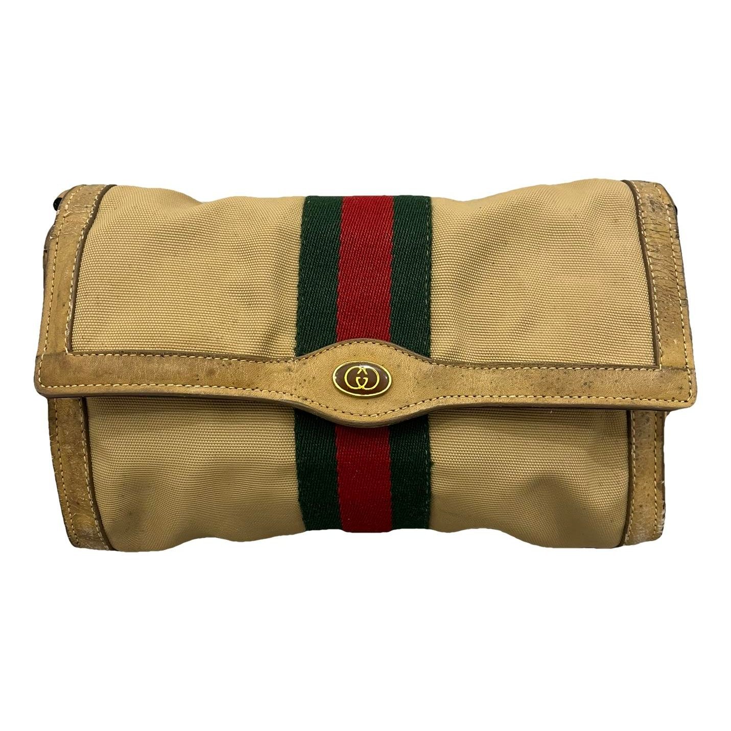Ophidia cloth clutch bag