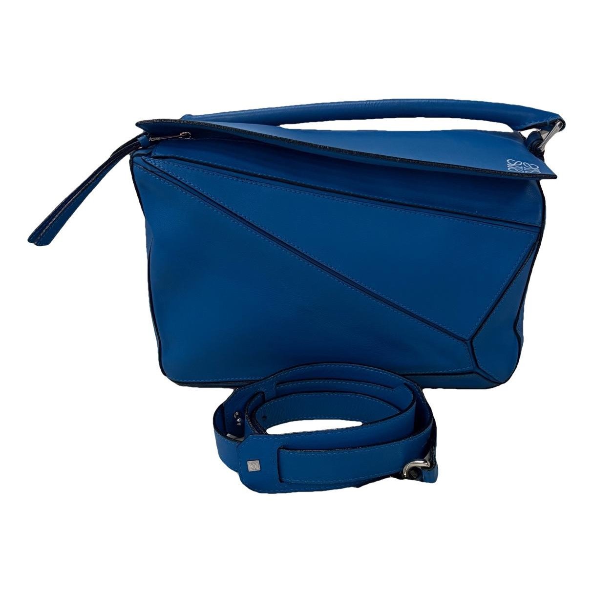 Puzzle leather handbag