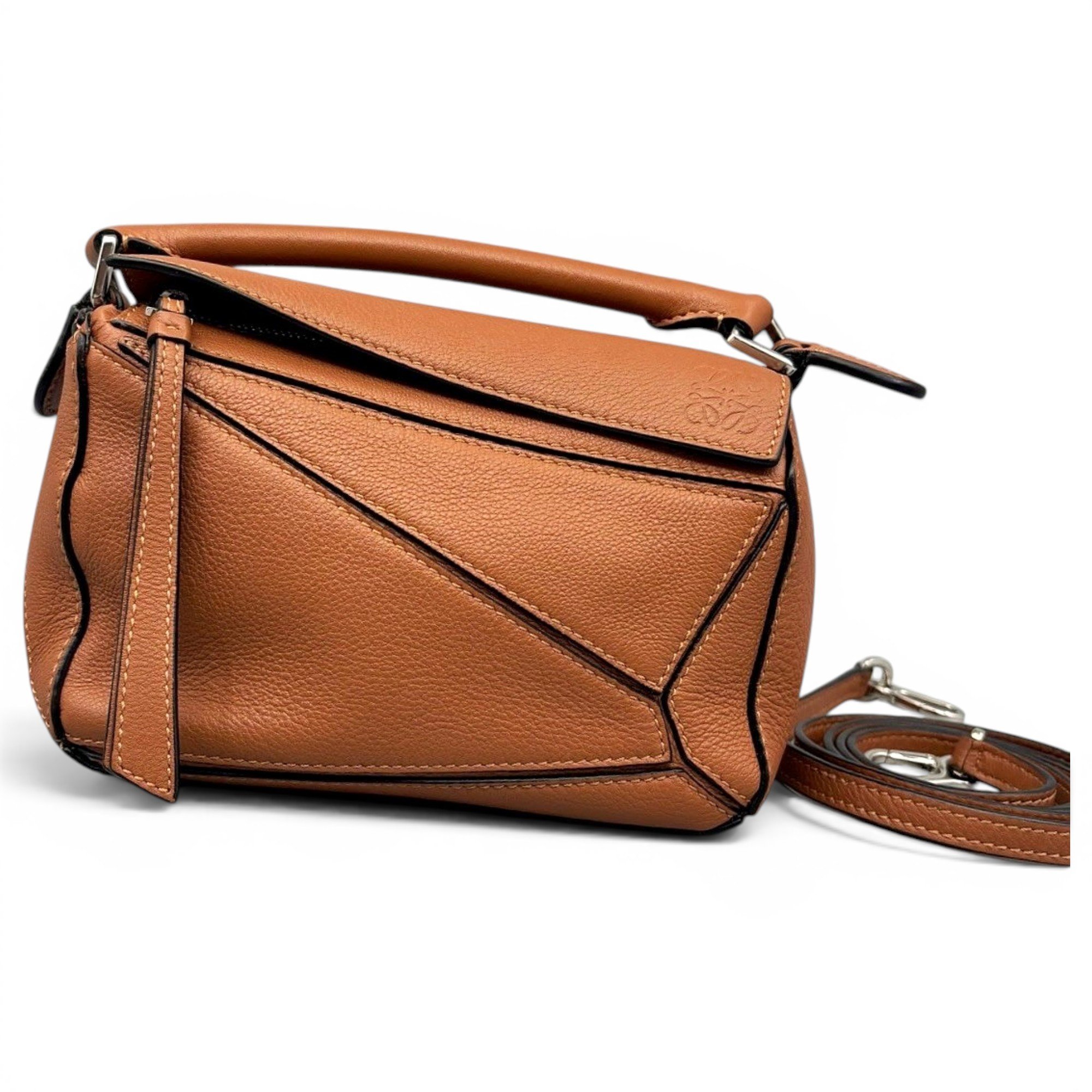 Puzzle leather handbag