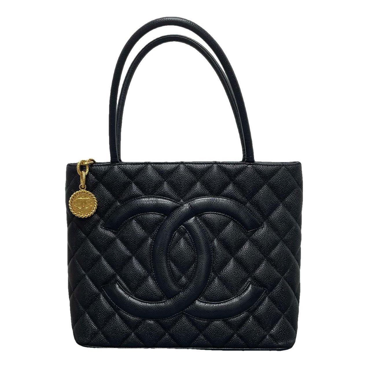 Médaillon leather handbag