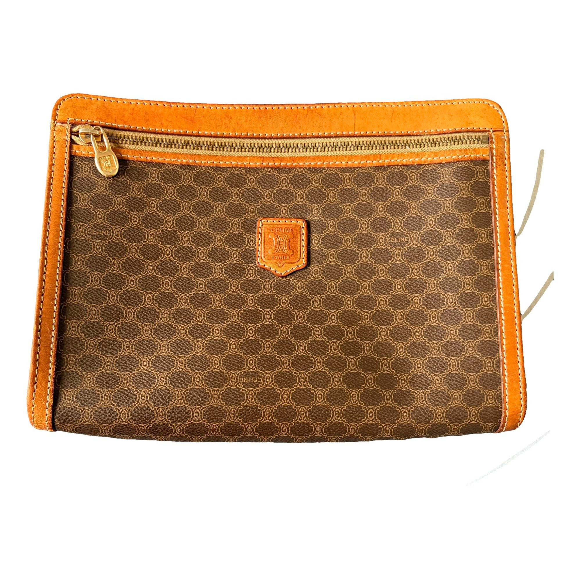 Triomphe Vintage leather clutch bag