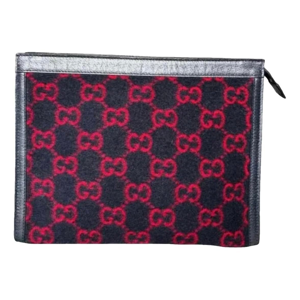 Ophidia wool clutch bag