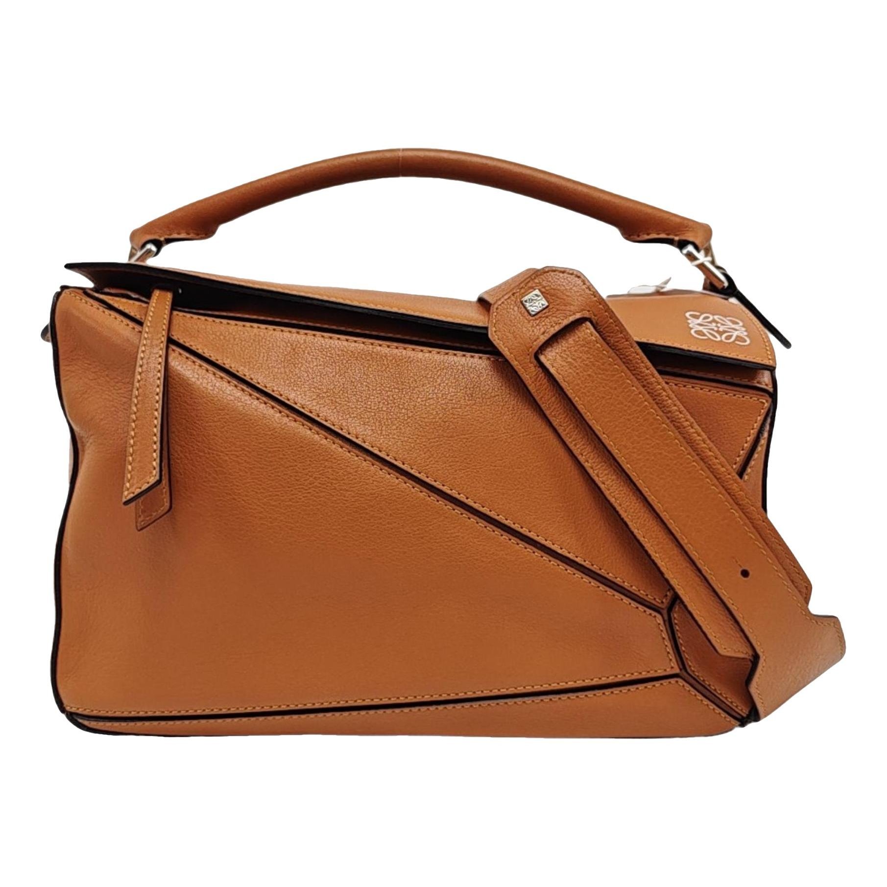Puzzle leather handbag