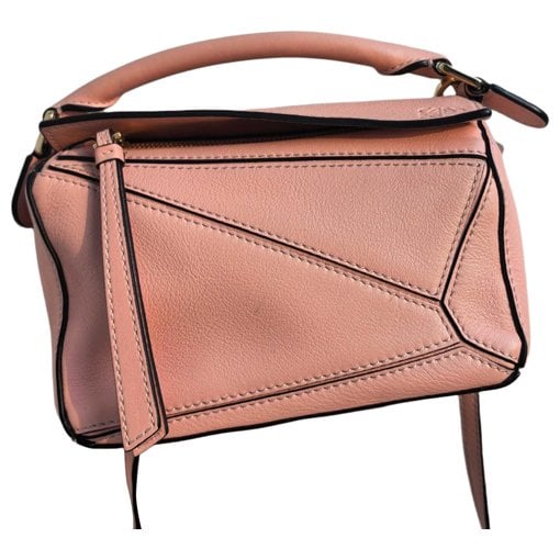 Puzzle leather handbag