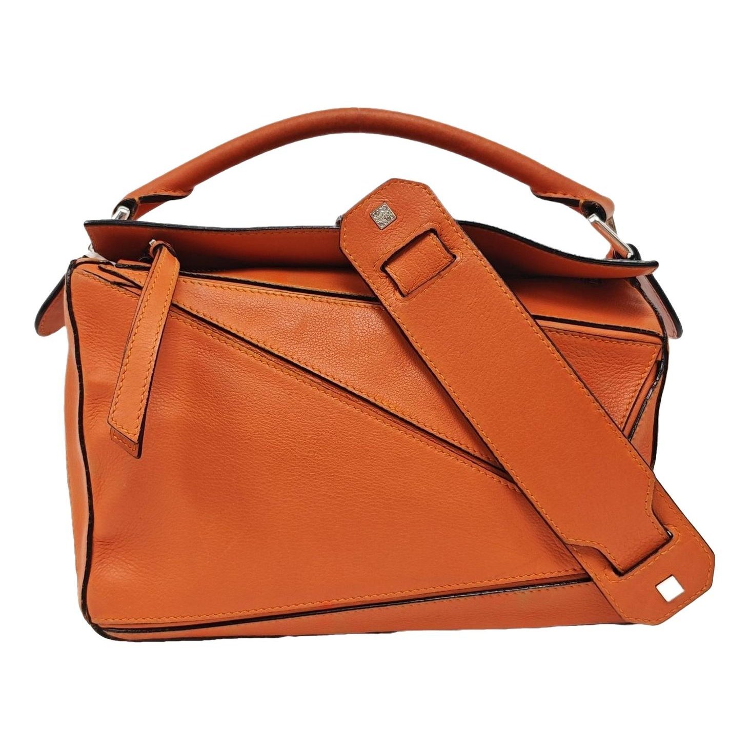 Puzzle leather handbag