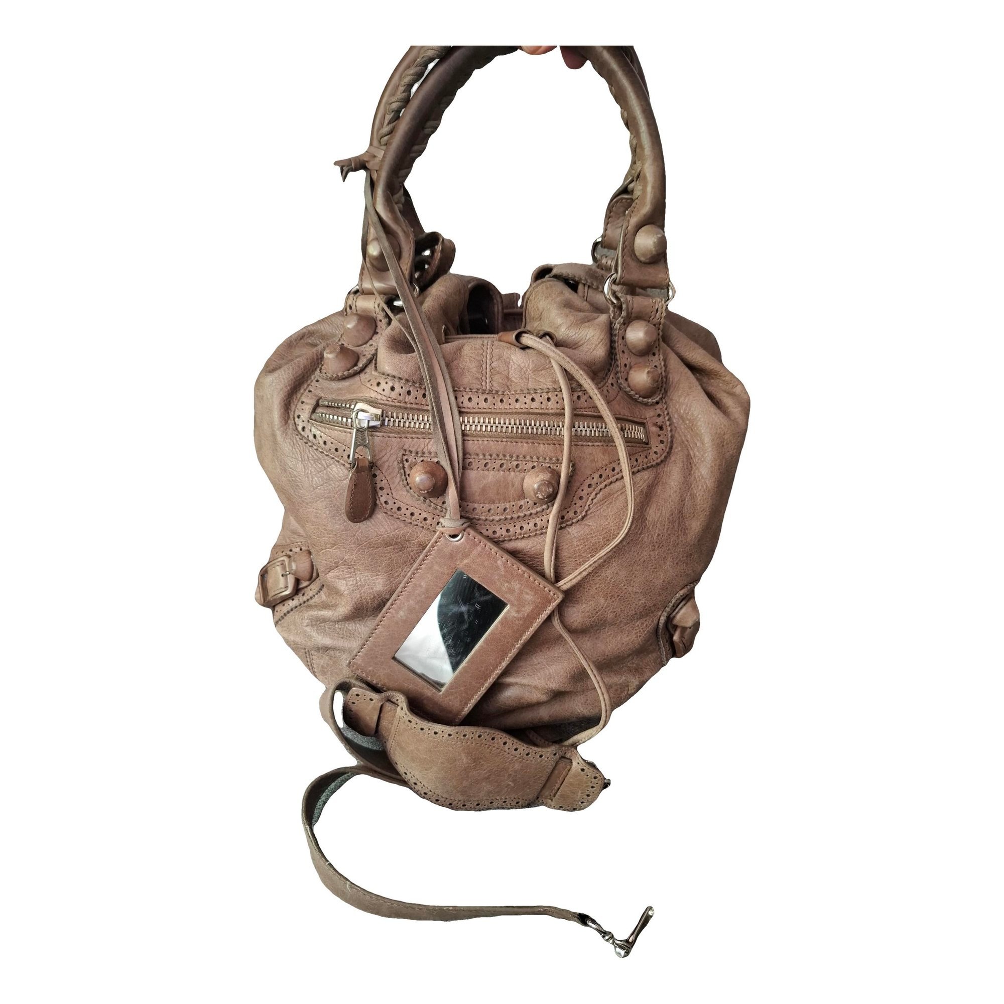 Pompon leather handbag