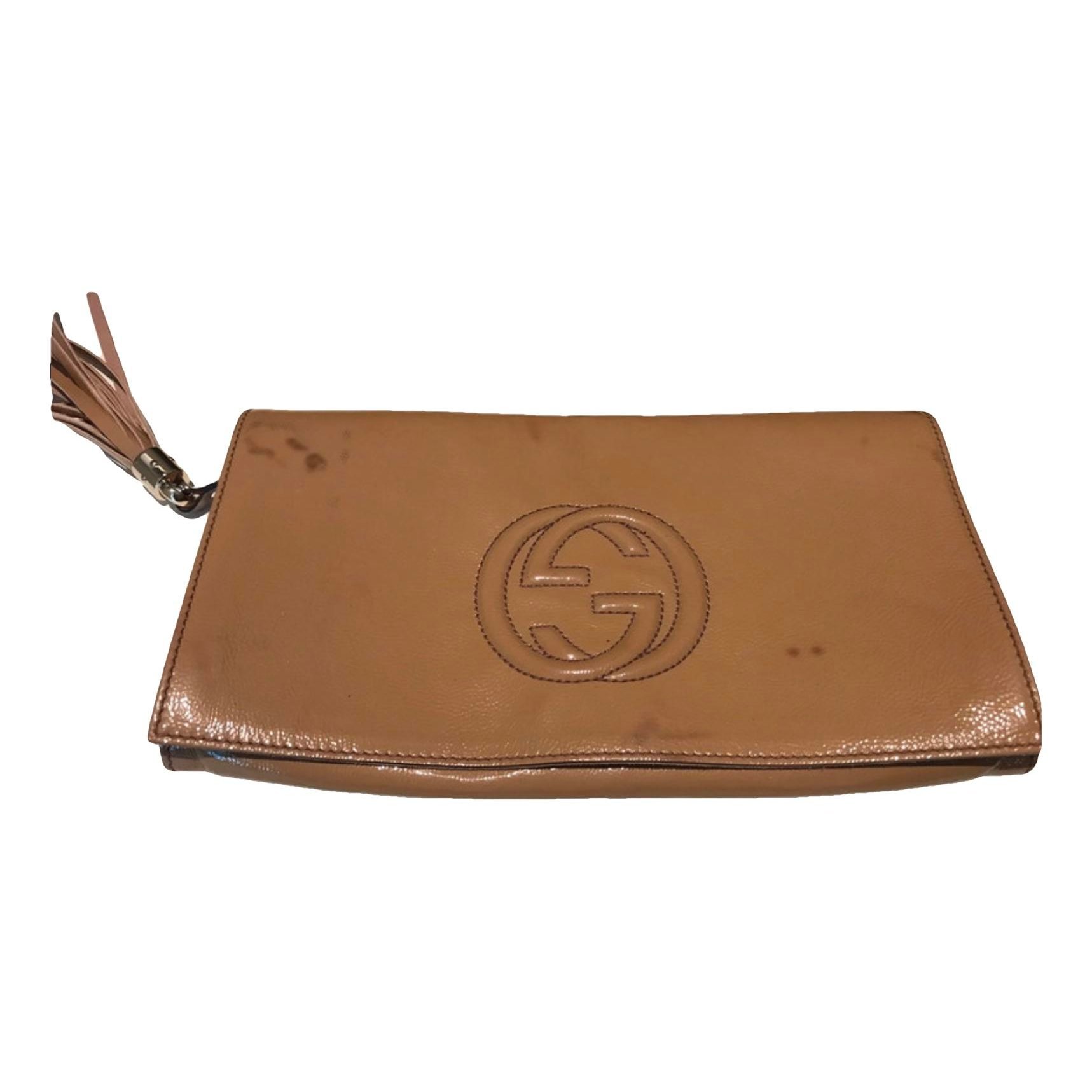 Patent leather clutch bag