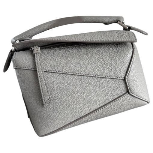 Puzzle leather handbag
