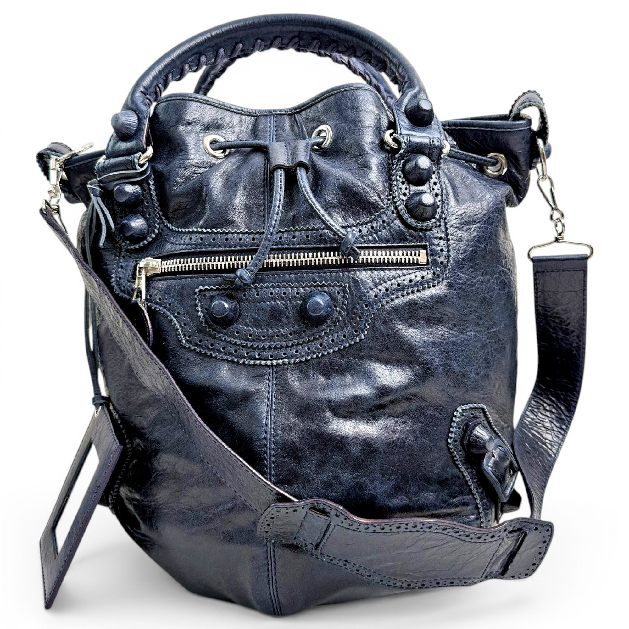 Pompon leather bag