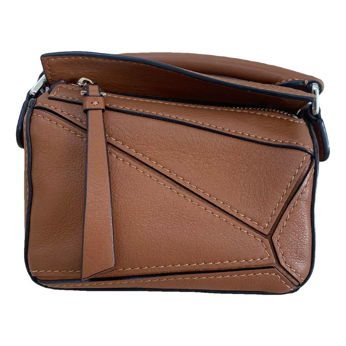 Puzzle leather handbag