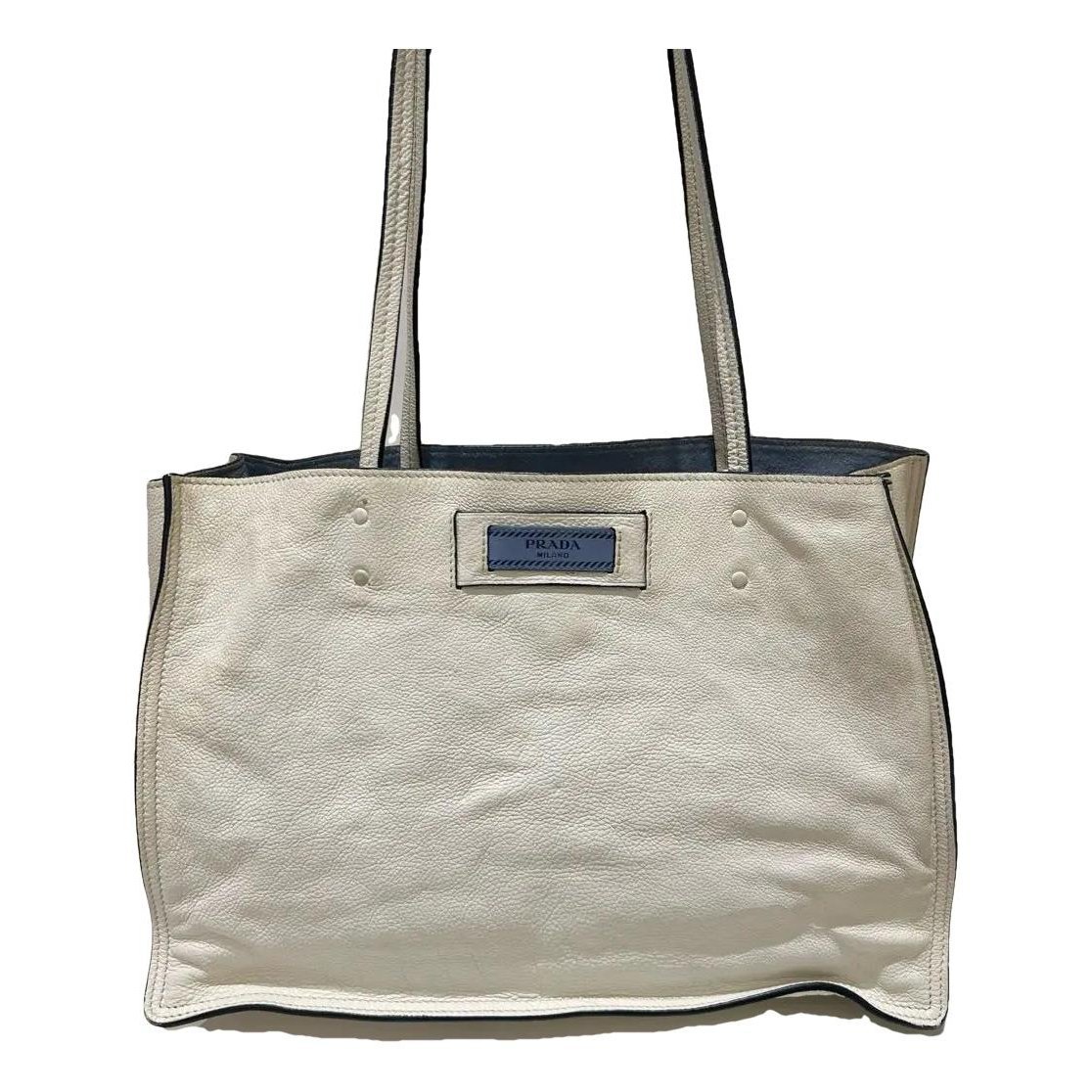 Etiquette leather handbag