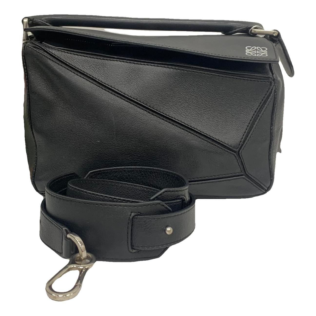 Puzzle leather handbag