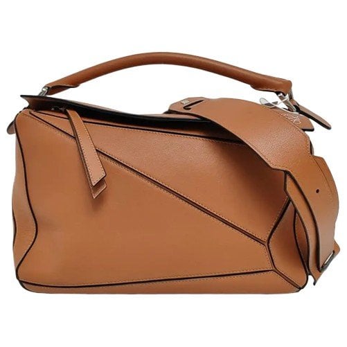 Puzzle leather handbag