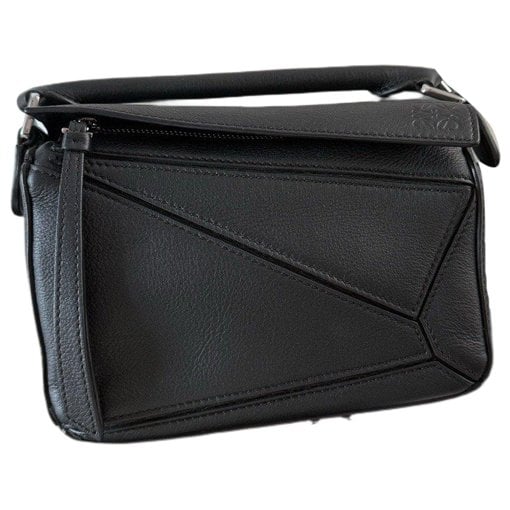 Puzzle leather handbag