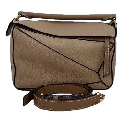 Puzzle leather handbag
