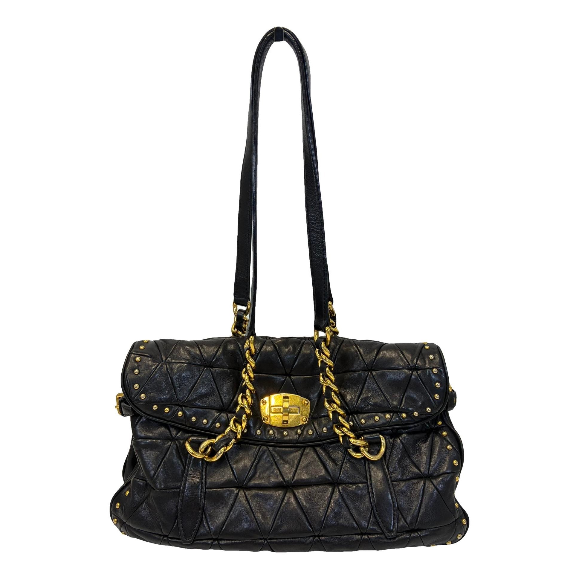 Matelassé leather clutch bag