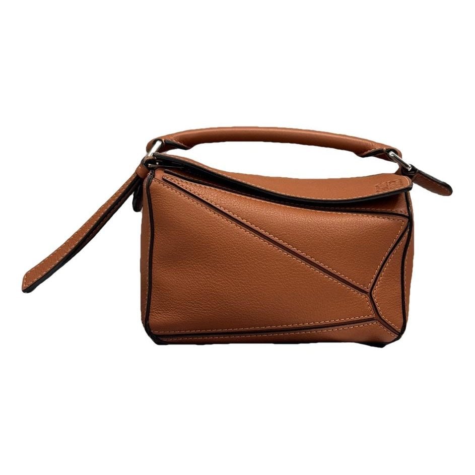 Puzzle leather handbag