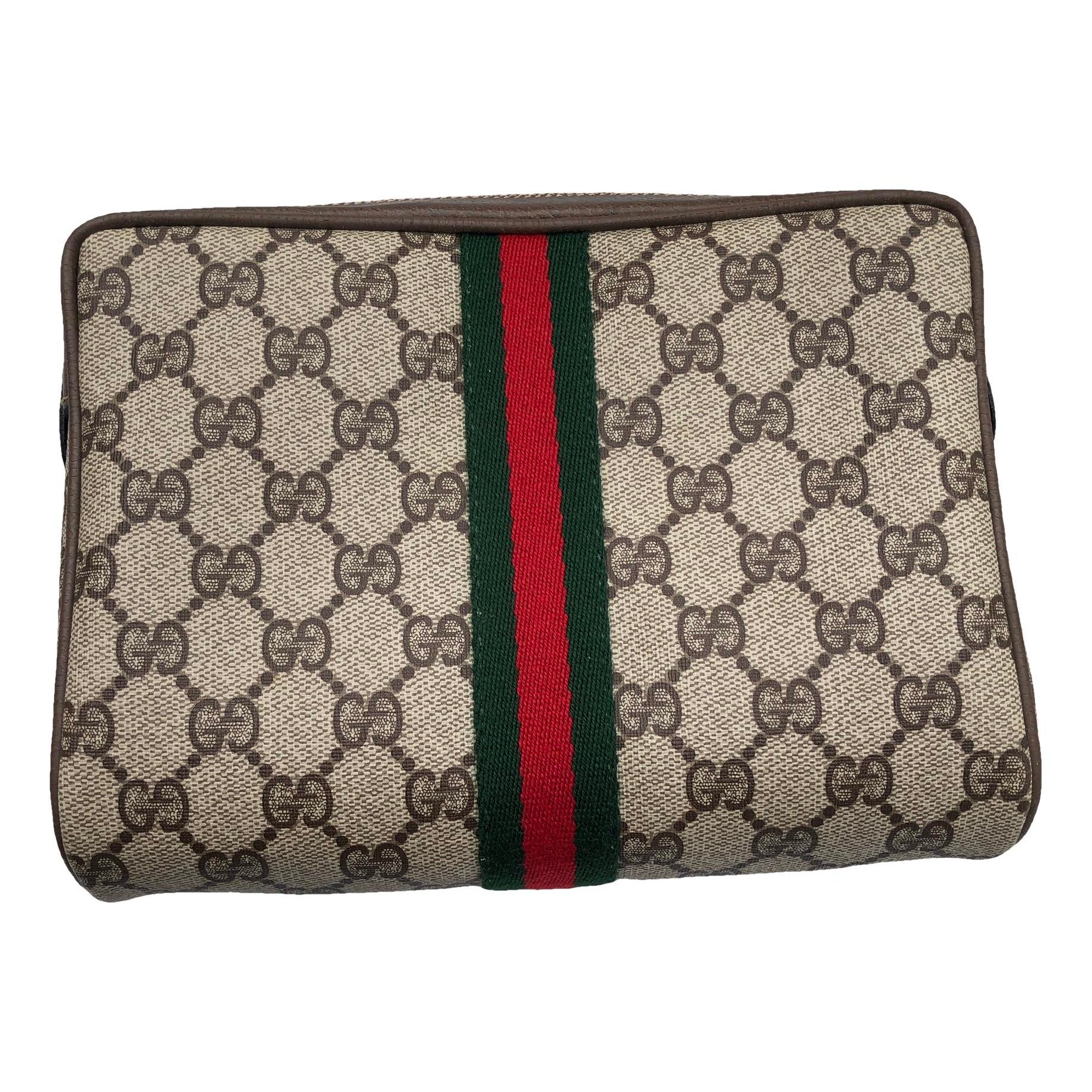 Ophidia patent leather clutch bag