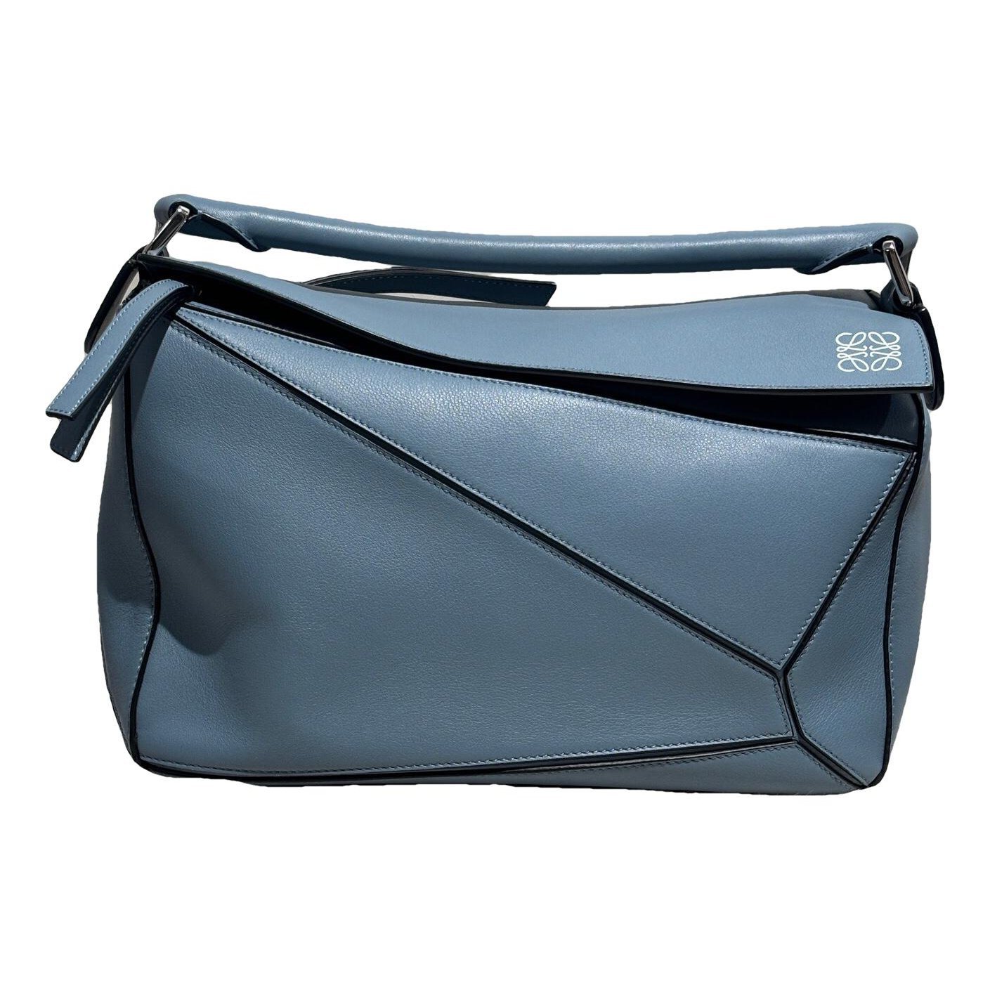 Puzzle leather handbag