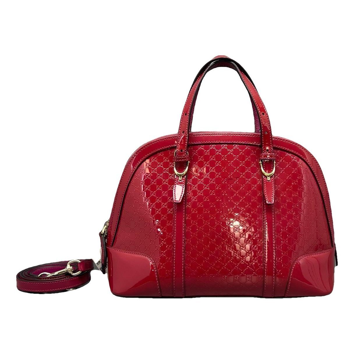 Dôme patent leather handbag