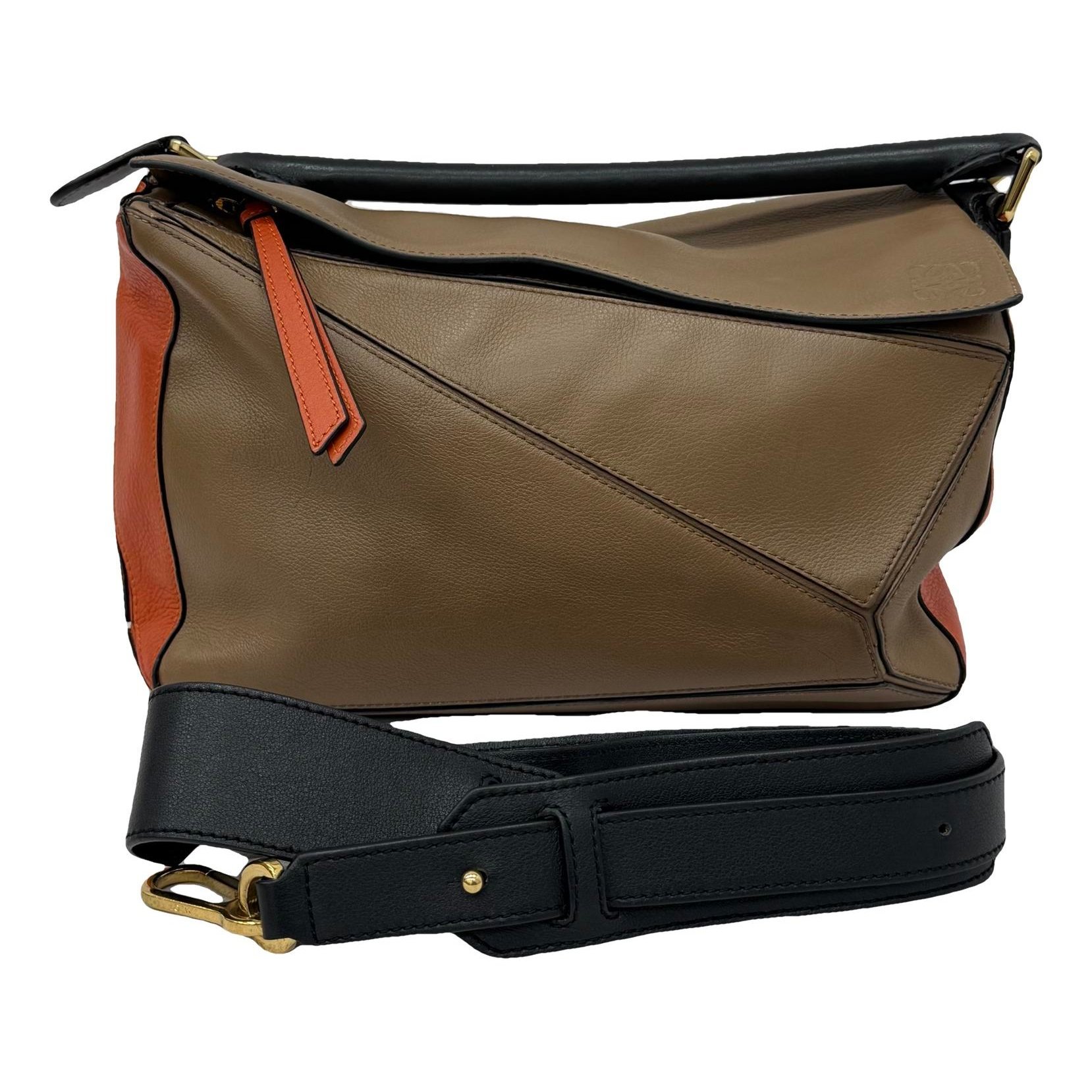 Puzzle leather handbag