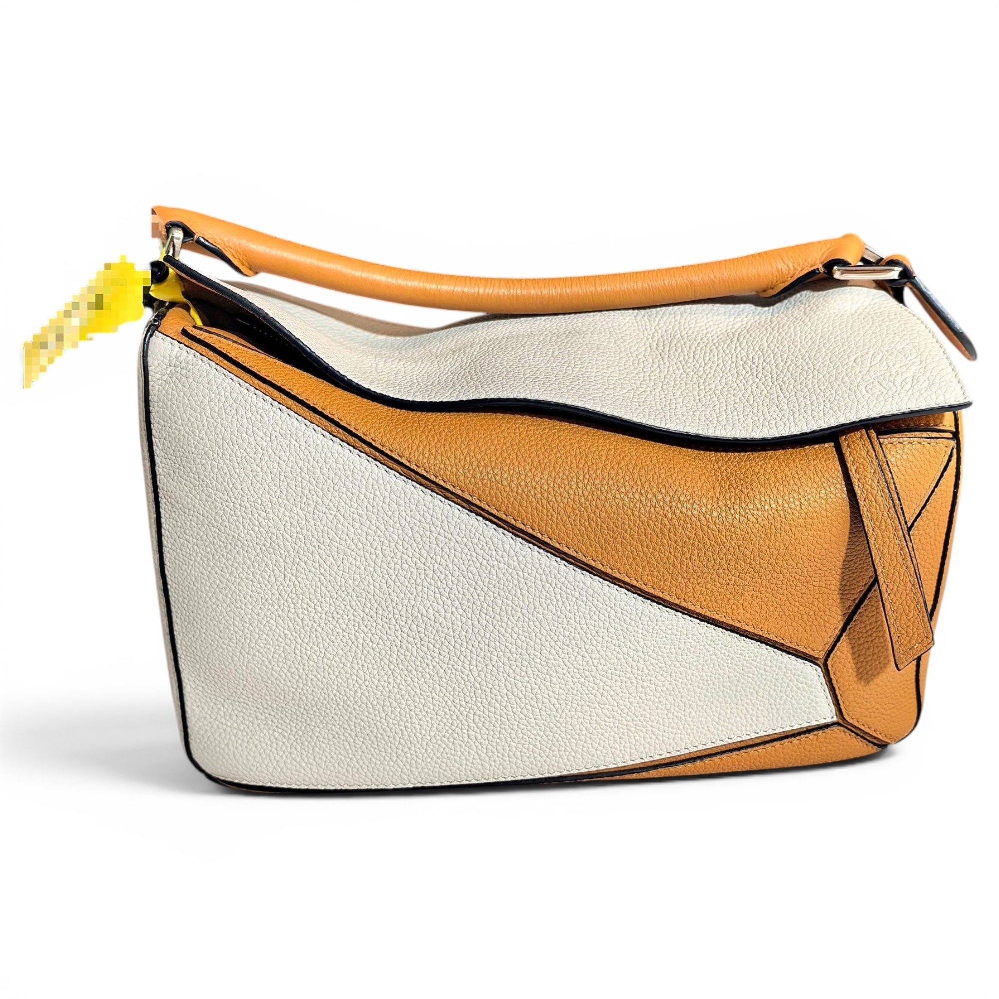 Puzzle leather handbag