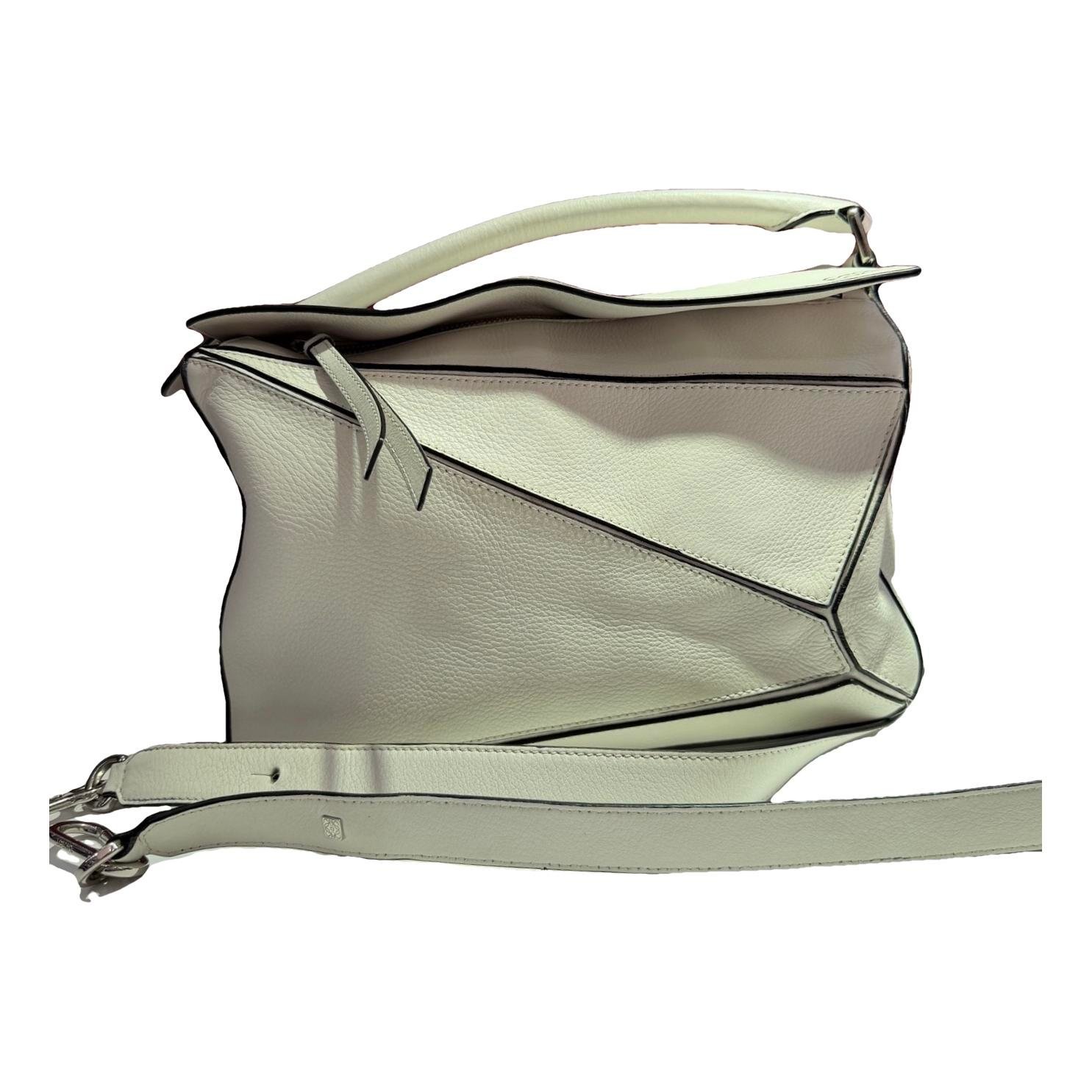 Puzzle leather handbag