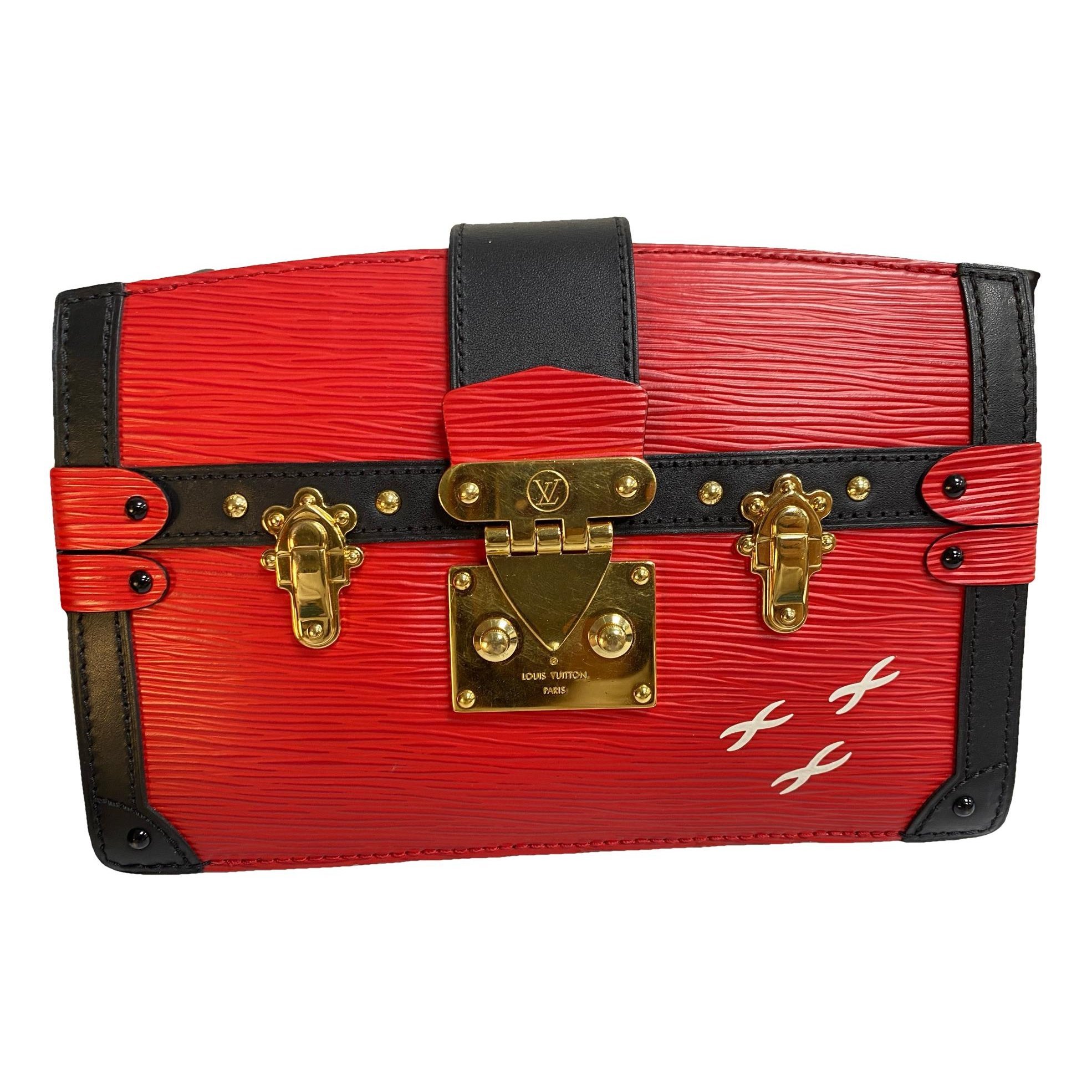 Pochette Trunk leather handbag