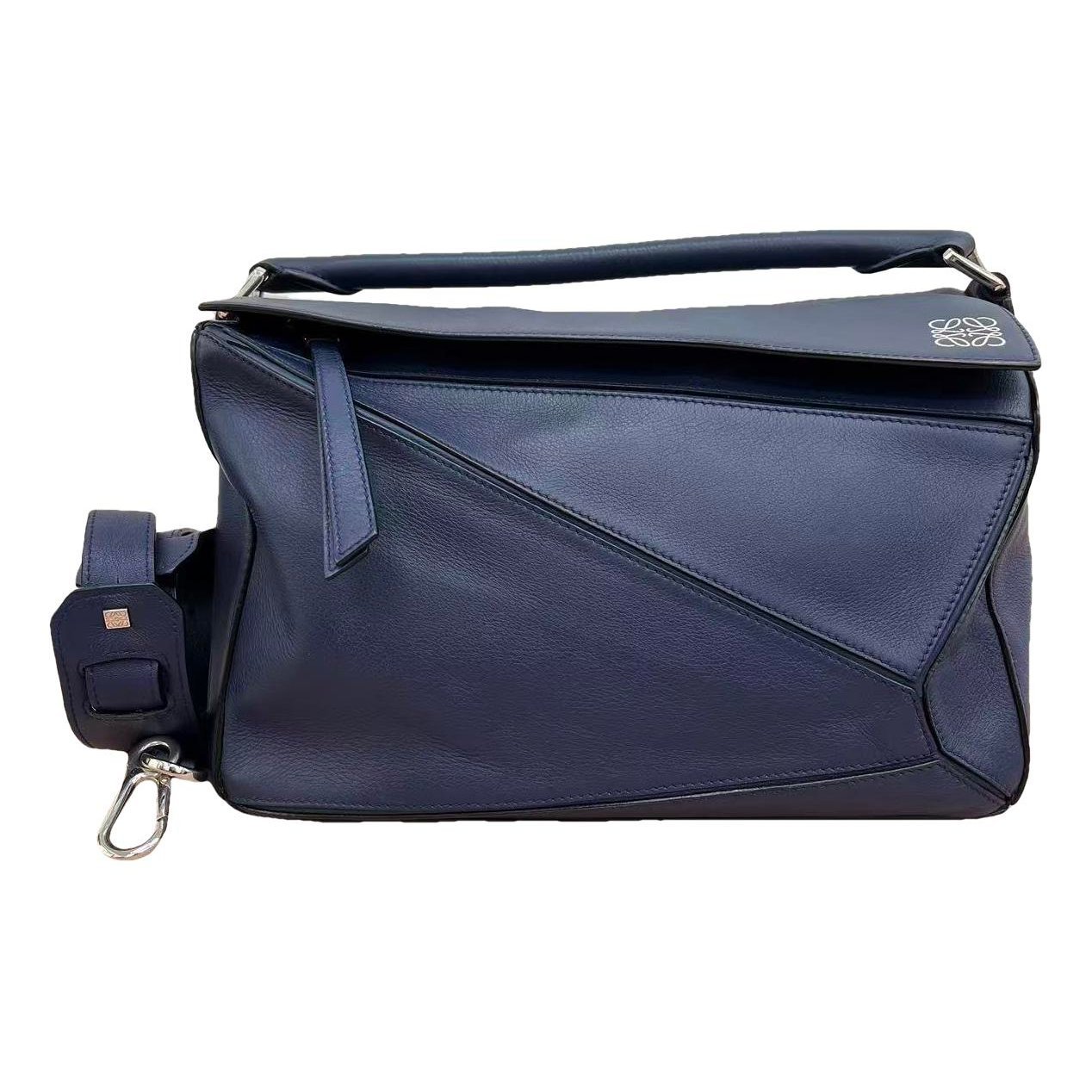 Puzzle leather handbag